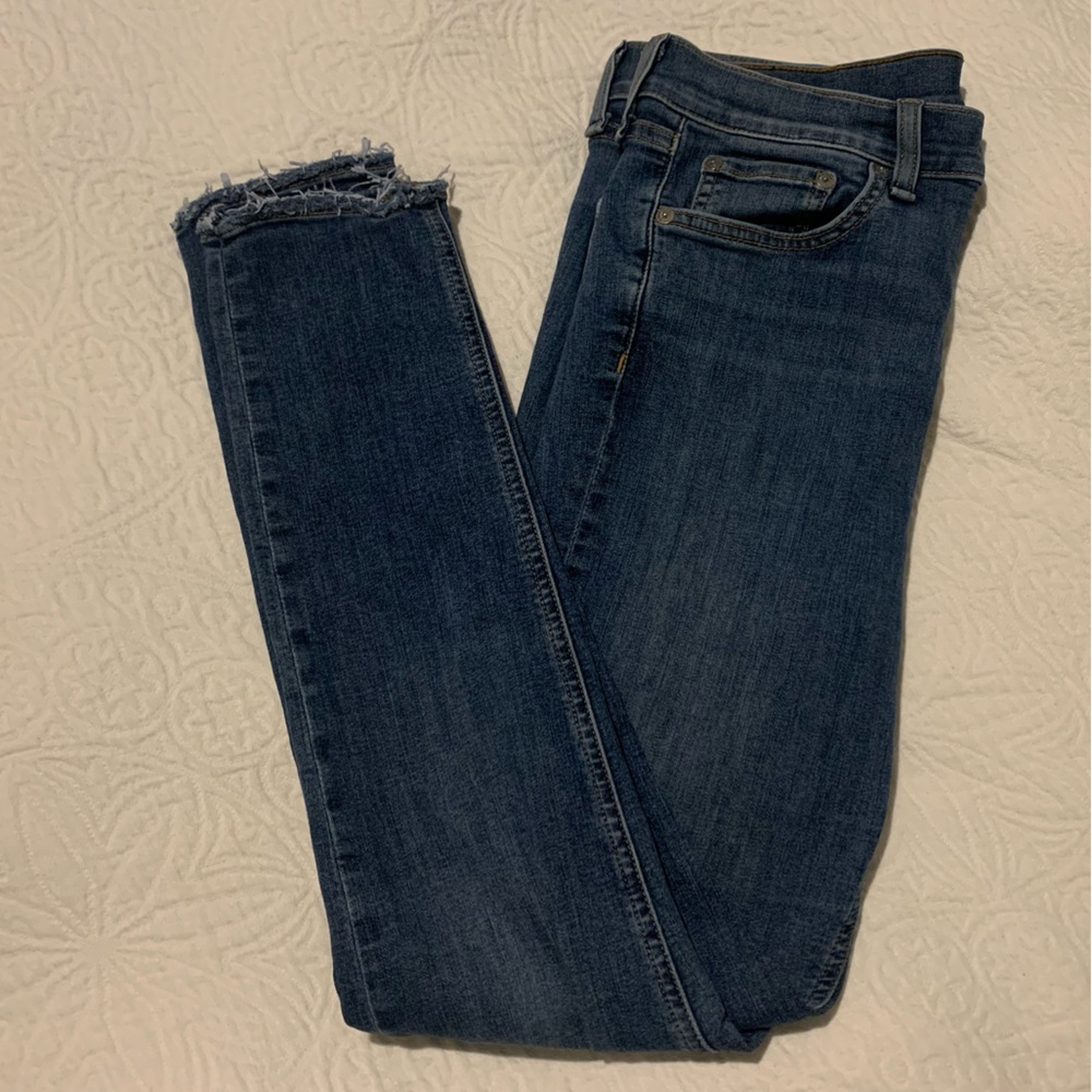 Rag & Bone jeans size 30. High rise ankle skinny. Stretchy, raw hem. Med wash
